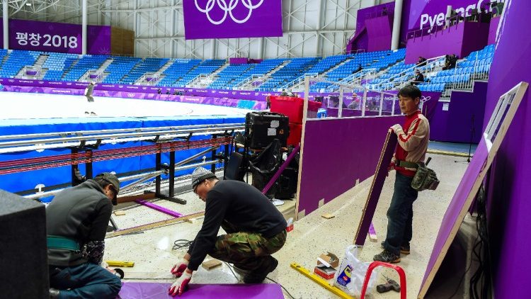 South Korean workers put finishing touches on the Ice Arena ahead of the Pyeongchang Winter Olympics
