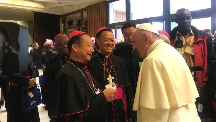 Pope Francis greets 2 Chinese Bishops at the Synod on Young People